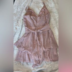 Spaghetti strap mauve romper. Brand new. Size Medium. A chiffon. Lined too